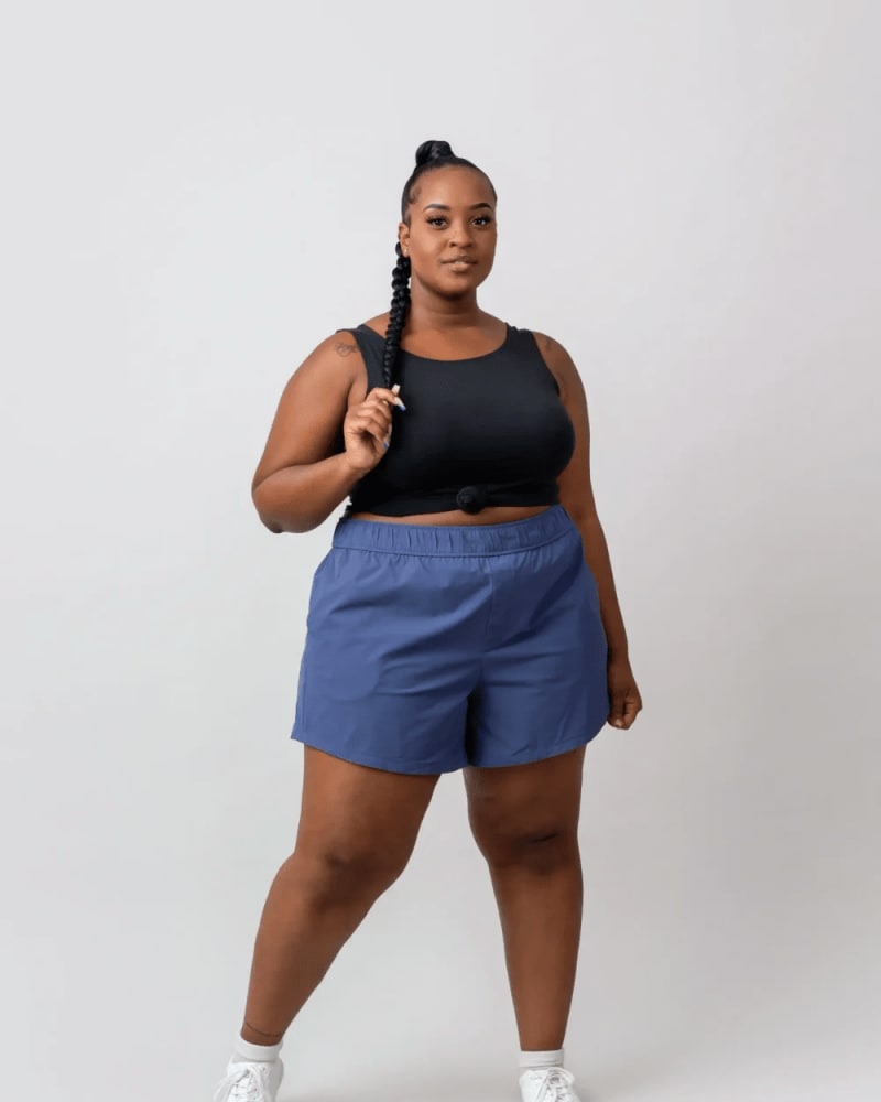 Front of a model wearing a size 6X surf's up shorts (5") in Moonlit Ocean by alder apparel. | dia_product_style_image_id:300704